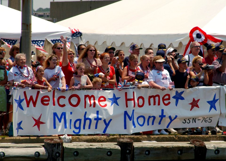 US Navy 030710-N-0000C-004 Friends and Family anxiously await the return of crewmembers assigned to the fast-attack submarine USS Montpelier (SSN 765). Montpelier is the last Norfolk-based submarine to return home from deployme