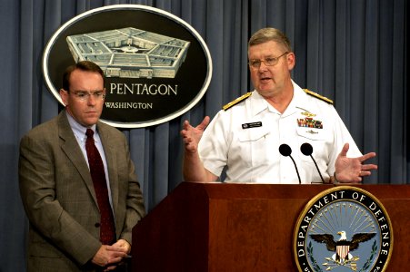 US Navy 030814-D-9880W-316 Rear Adm. John Butler responds to a technical question from a reporter during a Pentagon press briefing on the details of a newly signed contract to acquire six Virginia Class submarines