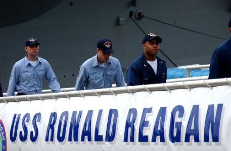 US Navy 030707-N-0696M-043 Ronald Reagan Sailors practice bringing the ship to life during rehearsals for the ship's commissioning ceremony, scheduled for July 12, 2003