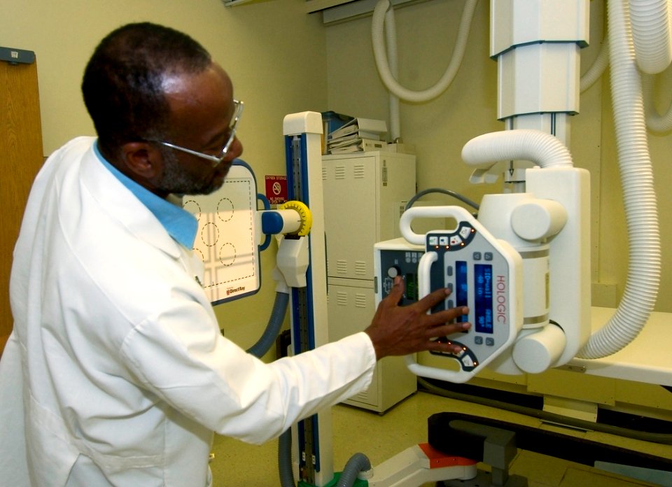US Navy 030820-N-9593R-014 Lead x-ray technologist, James Crisler demonstrates the ease of setting up a Direct Ray digital machine