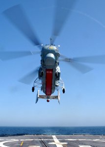 US Navy 030612-N-4374S-030 The Russian Helix KA-27 helicopter launches off the flight deck of USS Vella Gulf (CG 72)