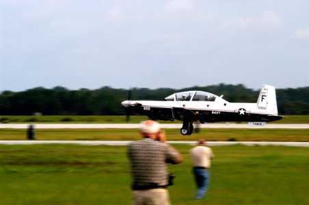 US Navy 030807-N-0000X-001 The T-6 Texan training aircraft takes off from the flight line at Naval Air Station (NAS) Pensacola