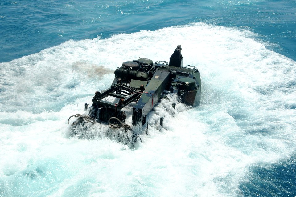 US Navy 100725-N-7680E-088 An amphibious assault vehicle exits the well deck of USS Iwo Jima (LHD 7)