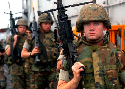 US Navy 030615-N-2819P-033 Lance Cpl. Clint D. Parker from Antioch, Tenn. assigned to 3rd Battalion 2nd Marine Regiment (3-2), participates in a small arms shoot on the flight deck aboard the amphibious assault ship USS Kearsar