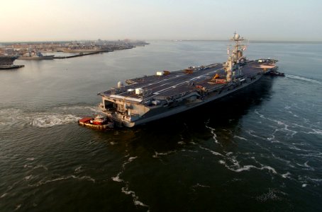 US Navy 030820-N-9851B-023 USS Harry S. Truman (CVN 75) pulls away from pier 14 south of Naval Station Norfolk (NOB) for her transit to the Norfolk Navy Shipyard