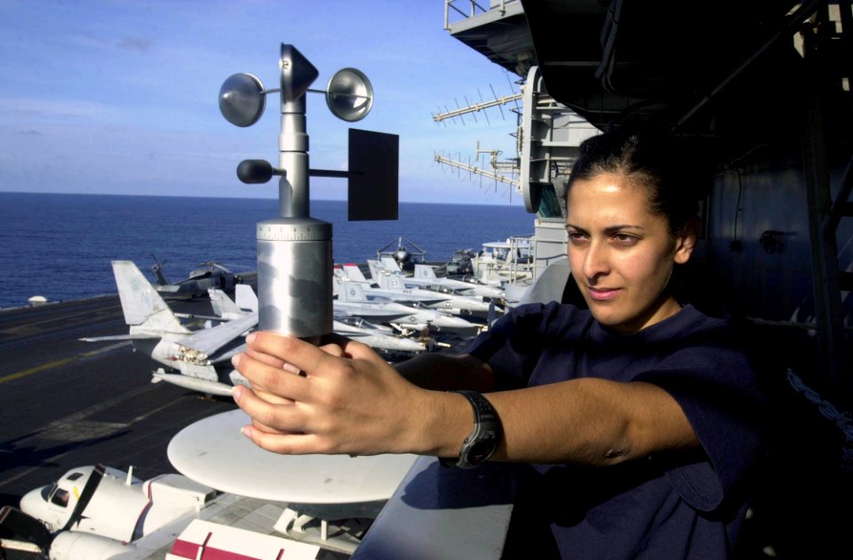 US Navy 030926-N-2143T-002 Aerographers Mate 3rd Class Faride Muwad from Orlando, Fla., reads surface winds