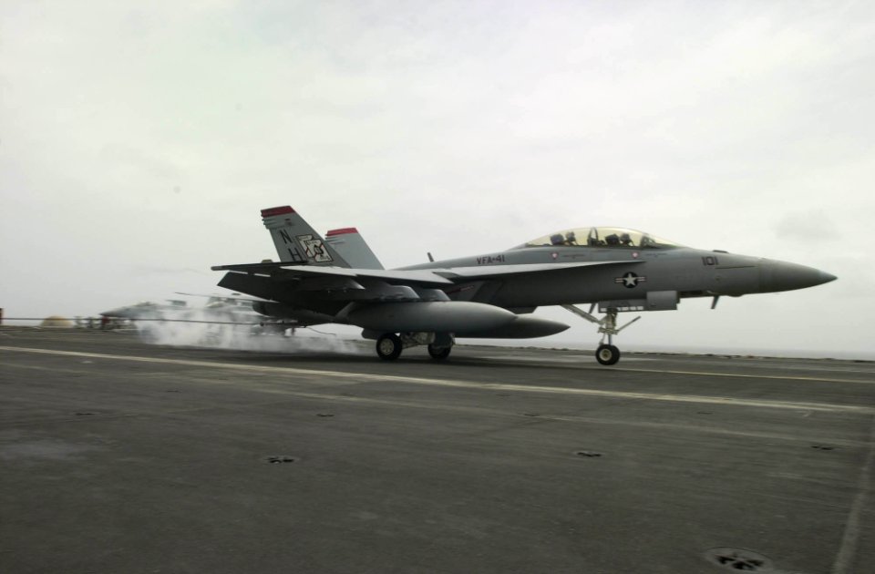 US Navy 030825-N-2385R-001 Vice Admiral Timothy J. Keating, Commander, U.S. Naval Forces Fifth Fleet, lands on the flight deck of USS Nimitz (CVN 68) in an F-A-18F Super Hornet