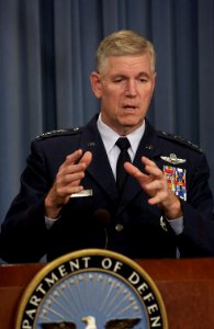 US Navy 031002-F-2828D-085 Chairman of the Joint Chiefs of Staff, Gen. Richard B. Myers, U.S. Air Force, gestures to make his point as he responds to a reporter's question during a Pentagon press briefing