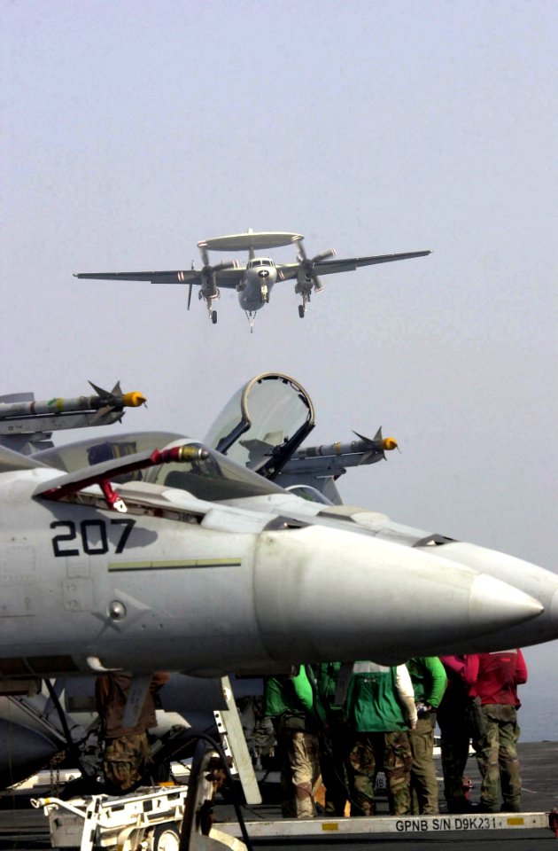 US Navy 030625-N-9319H-017 An E-2C Hawkeye approaches the flight deck in preparation for an arrested landing aboard USS Nimitz (CVN 68)