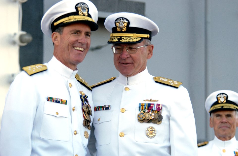 US Navy 031003-N-5319A-007 Admiral Vern Clark, Chief of Naval Operations (CNO) congratulates Adm. Robert J. Natter, Commander U.S. Atlantic Fleet, during his Change of Command ceremony