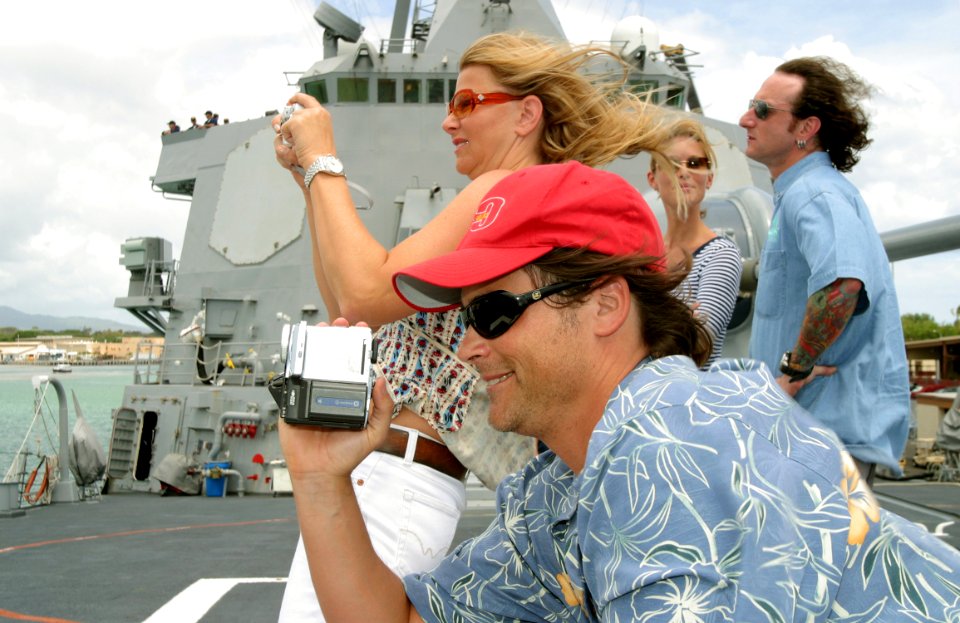 US Navy 030630-N-3228G-002 Actor Rob Lowe, and wife Sheryl Berkoff take photos during a tour of the guided missile destroyer USS Russell (DDG 59)