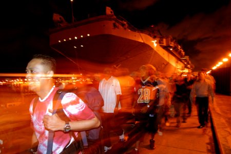 US Navy 030702-N-3228G-003 ailors and Marines attached to the amphibious assault ship USS Tarawa (LHA 1) go on liberty in Pearl Harbor during a four-day port visit