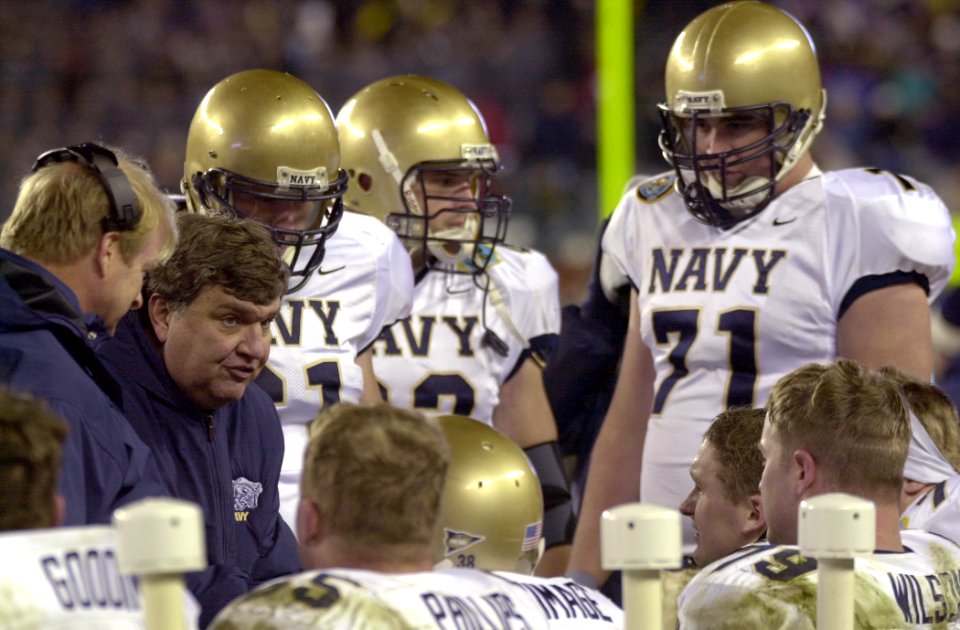 US Navy 031206-N-9693M-508 Navy head coach Paul Johnson talks to the offensive line during the 104th Army Navy Game
