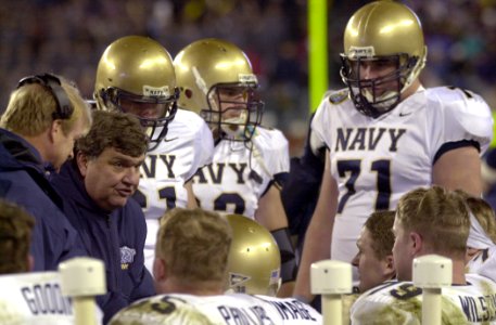 US Navy 031206-N-9693M-508 Navy head coach Paul Johnson talks to the offensive line during the 104th Army Navy Game