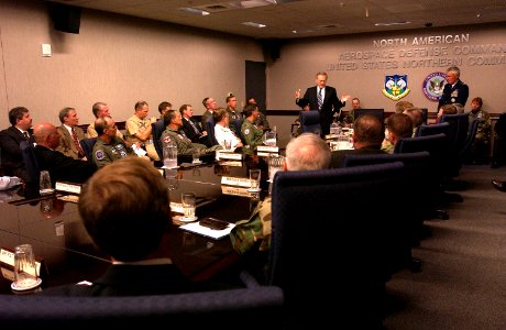 US Navy 031006-F-2828D-098 Secretary of Defense Donald H. Rumsfeld and Air Force General Ralph Ederhart, Commander, United States Northern Command, talk with senior military leadership