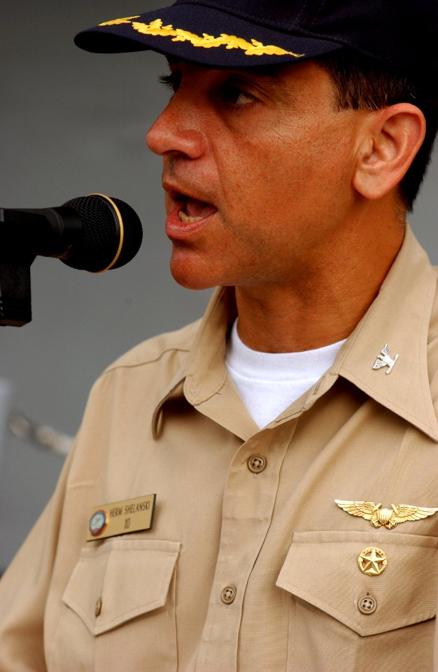 US Navy 030708-N-0696M-055 Capt. Herm Shelanski, Executive Officer of Pre-commissioning Unit (PCU) Ronald Reagan (CVN 76), rehearses his part as master of ceremonies for the ship's commissioning ceremony, scheduled for Ju