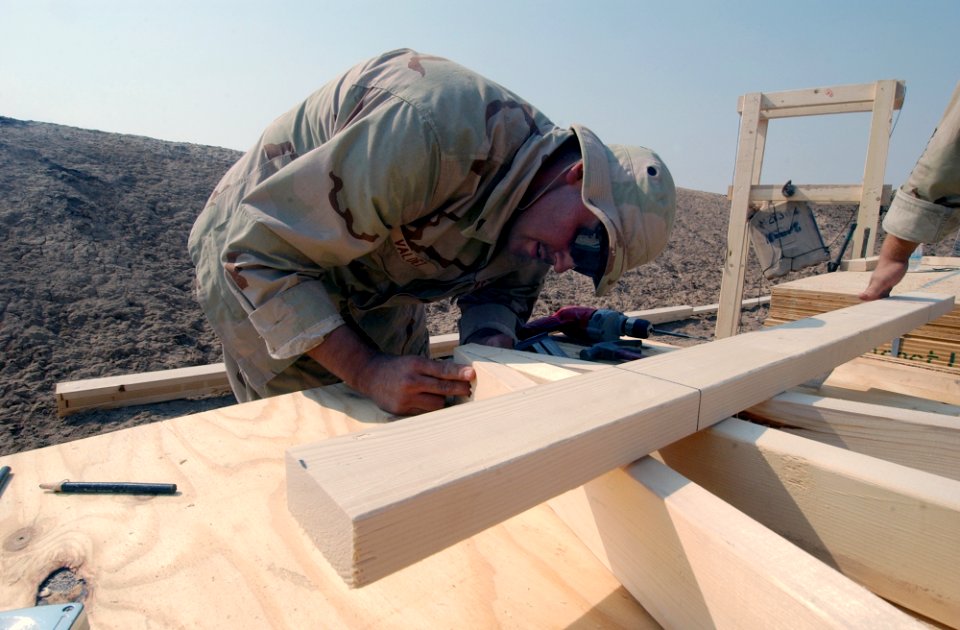 US Navy 031015-N-3236B-002 Lance Cpl. Rodolfo Valdez, from Pasadena, Calif., constructs an easel