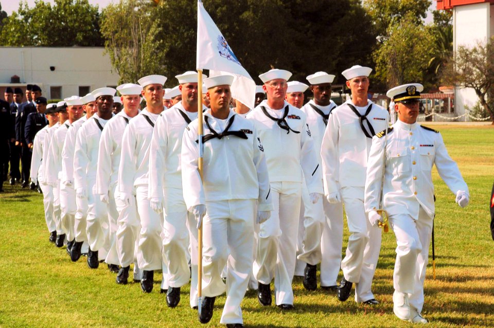 US Navy 030925-N-5996C-001 Navy personnel pass in review during Naval Station Rota's