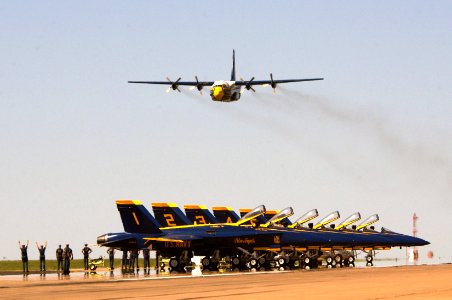 US Navy 030928-N-4534A-001 The Blue Angels C-130 Hercules Transport, Fat Albert, performs its High Speed Pass photo