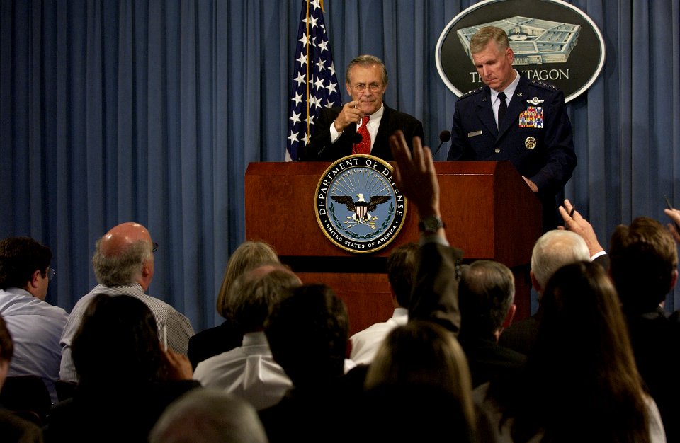 US Navy 031002-F-2828D-227 Secretary of Defense, Donald H. Rumsfeld responds to a reporter's question during a Pentagon press briefing