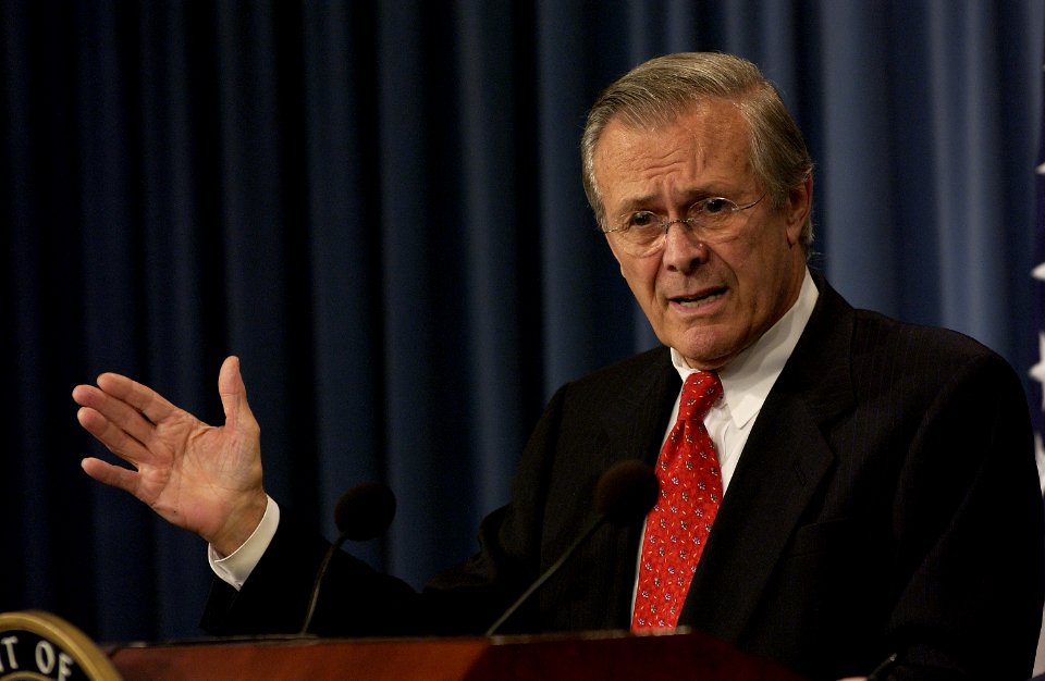 US Navy 031002-F-2828D-152 Secretary of Defense, Donald H. Rumsfeld responds to a reporter's question during a Pentagon press briefing