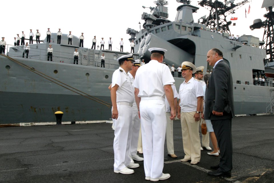 US Navy 031024-N-3228G-008 Members of the official greeting party and interpreters prepare for a press conference in front of Federation Navy Udaloy Class destroyer Marshal Shaposhnikov (DDG 543)