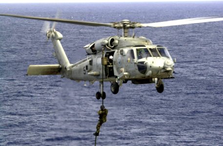US Navy 031005-N-1577S-002 Explosive Ordnance Disposal Mobile Unit Eleven Detachment One (EODMU-11, DET 1) prepares to fast rope