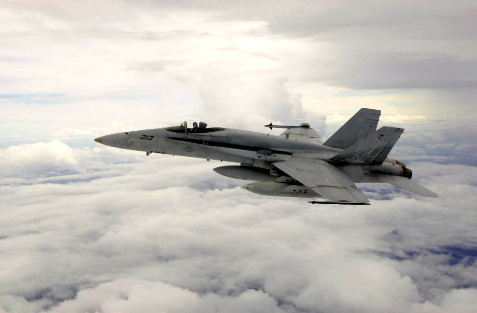 US Navy 031003-N-6536T-001 An F-A-18C Hornet patrols the skies