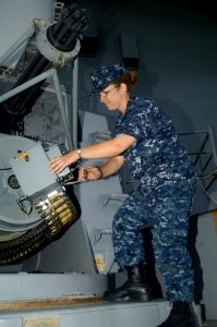 US Navy 100714-N-0569K-062 Sailor inspects weapons system aboard USS Enterprise