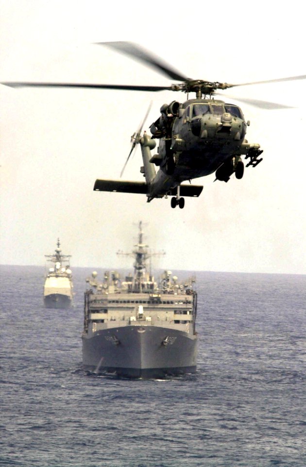 US Navy 031005-N-1577S-001 Explosive Ordnance Disposal Mobile Unit Eleven Detachment One (EODMU-11, DET 1) prepares to fast rope