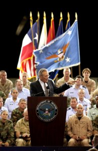 US Navy 030825-F-2828D-286 Secretary of Defense Donald H. Rumsfeld gestures to make a point as he answers a question from a member of the audience during a town hall meeting at Lackland Air Force Base, San Antonio photo