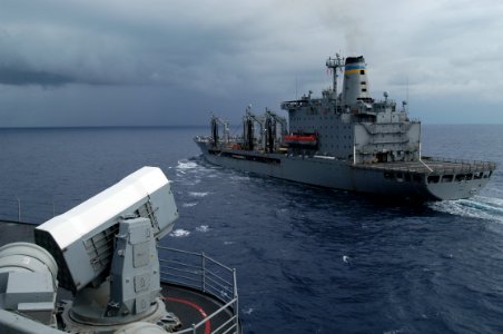 US Navy 031103-N-5821P-001 USS Kitty Hawk (CV 63) comes alongside the Military Sealift Command ship USNS Yukon (T AO 202)
