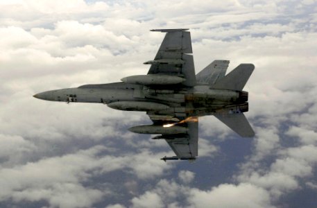US Navy 031003-N-6536T-002 An F-A-18C Hornet shoots off a practice flare
