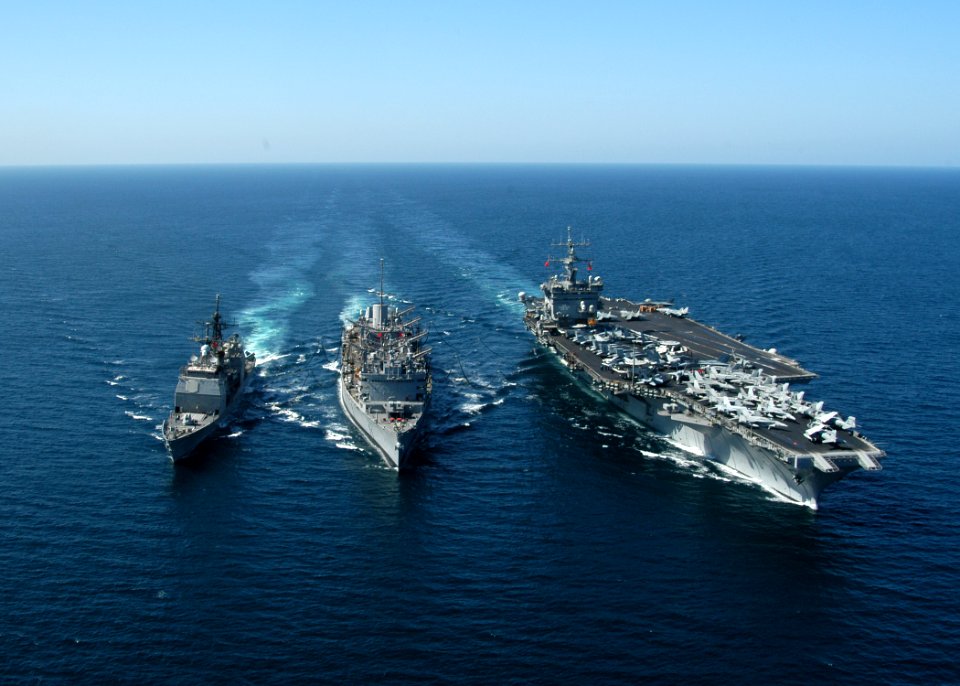 US Navy 031111-N-6259P-007 The guided missile cruiser USS Gettysburg (CG-64) and nuclear-powered aircraft carrier USS Enterprise