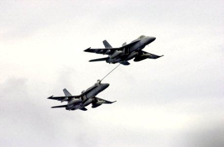 US Navy 031005-N-2143T-002 Two F-A-18 Hornets refuel photo