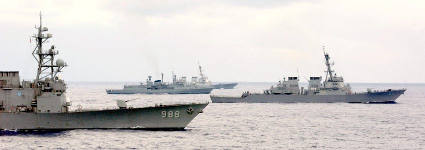 US Navy 030905-N-5471P-008 Enterprise Carrier Strike Group (CSG) ships perform divisional tactics while underway in the Atlantic Ocean