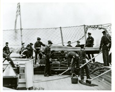 US Navy 031021-O-0000B-001 In this Mathew Brady photograph, a nine-inch Dahlgren gun on a slide-pivot mounting is seen in operation aboard a U.S. Navy warship during the Civil War