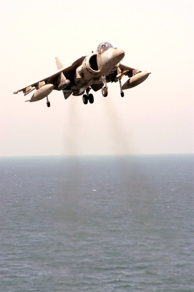US Navy 031007-N-6895M-004 An AV-8B Harrier approaches the flight deck of USS Peleliu (LHA 5)