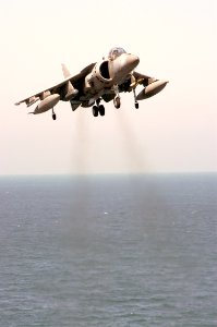 US Navy 031007-N-6895M-004 An AV-8B Harrier approaches the flight deck of USS Peleliu (LHA 5)