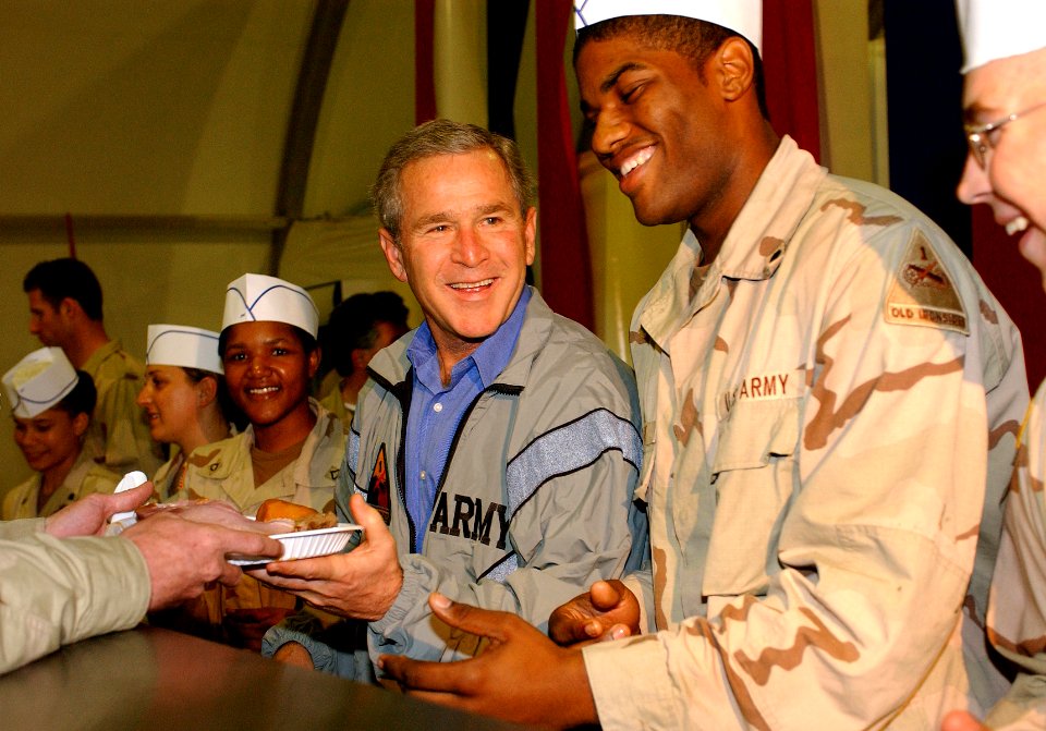 US Navy 031127-F-5435R-009 President George W. Bush pays a surprise visit to Baghdad International Airport (BIAP)