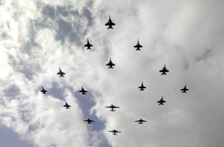 US Navy 031101-N-2385R-014 Carrier Air Wing Eleven (CVW-11) concludes the air show by flying in formation over USS Nimitz (CVN 68) during a Tiger Cruise aboard the ship