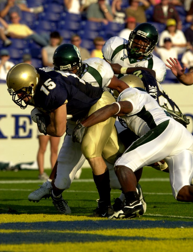 US Navy 031101-N-9693M-887 Navy slot back Frank Divis scores on a rushing attempt during Navy's 35-17 victory over Tulane
