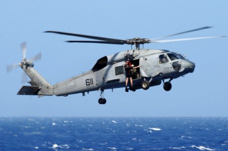 US Navy 031124-N-5821P-002 Aviation Warfare Systems Operator 2nd Class (AW2) Bennie Romiti of San Diego, Calif