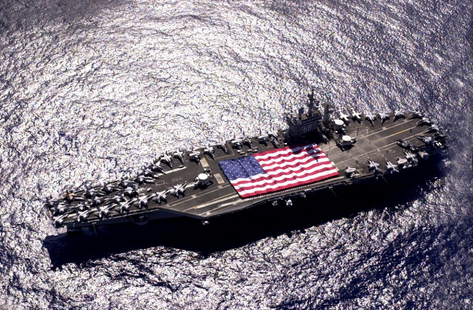 US Navy 031103-N-6536T-006 USS Nimitz (CVN 68) and Carrier Air Wing Eleven (CVW-11) personnel participate in a flag unfurling rehearsal