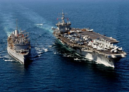 US Navy 031111-N-6259P-006 The guided missile cruiser USS Gettysburg (CG-64) and nuclear-powered aircraft carrier USS Enterprise