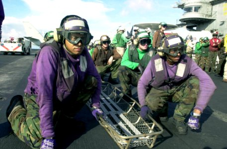 US Navy 030927-N-2385R-002 Airman Gerald Shaw, from Detroit, Mich., and Airman Matthew Johnson, from Montgomery, Ala., participate in a mass casualty drill