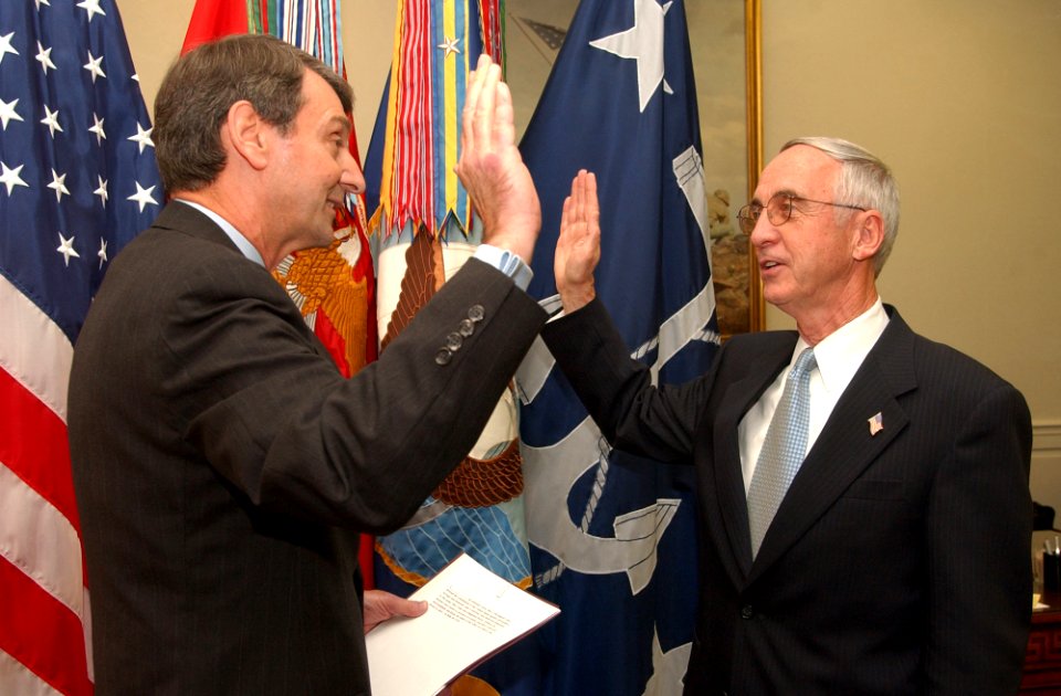 US Navy 031001-N-2568S-002 The Honorable Gordon R. England, right, receives the oath of office, during a short swearing in ceremony as the 73rd Secretary of the Navy
