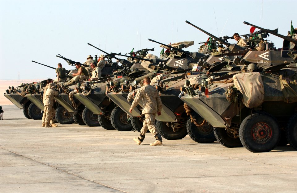 US Navy 031215-N-3236B-003 Marines assigned to the 13th Marine Expeditionary Unit (13th MEU) 1st Light Armor Reconnaissance Battalion Landing Team (1st LAR BLT 1-1) perform maintenance on Light Armored Vehicles