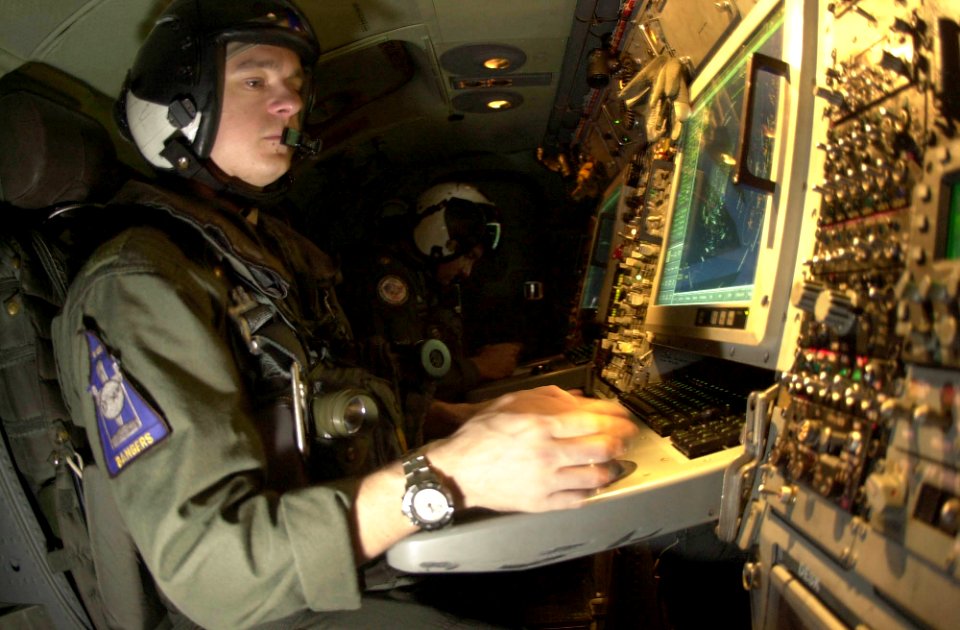 US Navy 031003-N-6536T-005 Lt. J.G. Jeff Holser operates the Advance Control Indicator Set (ACIS) Scope