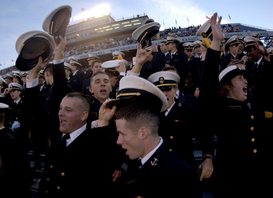 US Navy 031122-N-9693M-006 U.S. Naval Academy Midshipmen celebrate a 63-34 victory over Central Michigan in Annapolis, Md